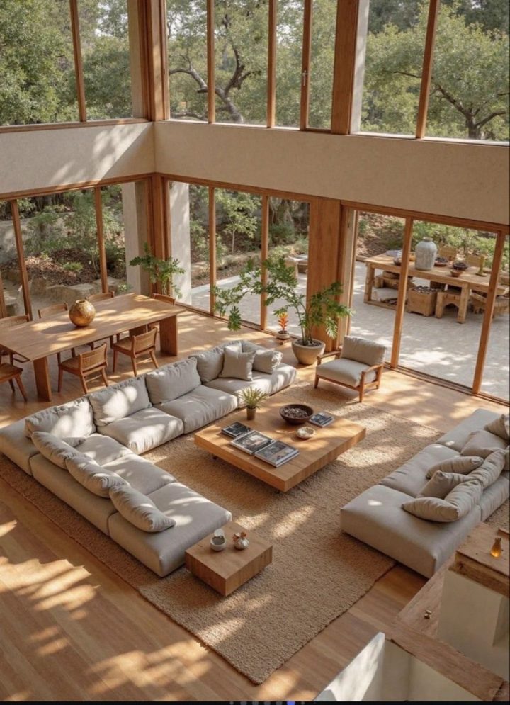 Phòng khách trần cao với sofa vải và kết cấu gỗ